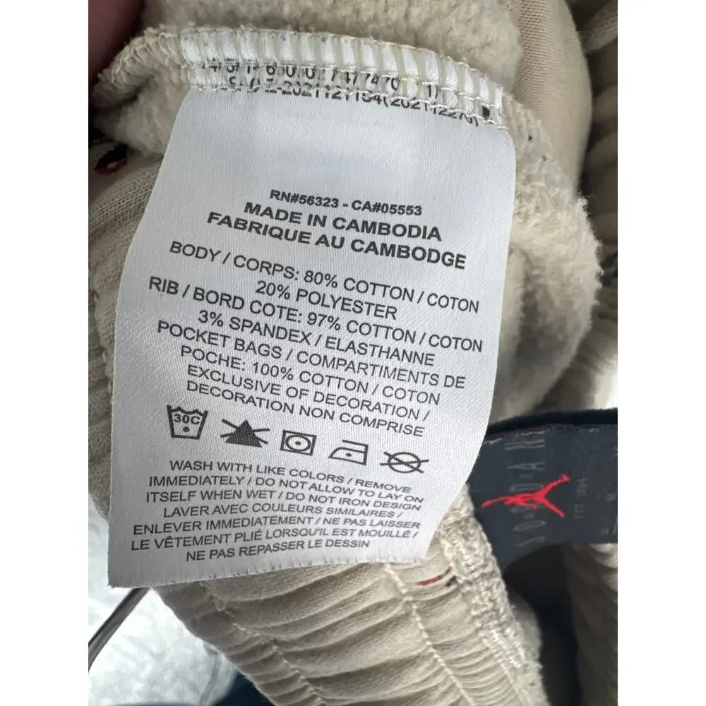 Air Jordan holiday edition fleece pants rattan all over print light brown size M